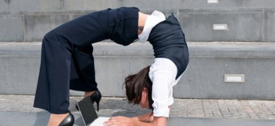 Lady bending over backwards to work