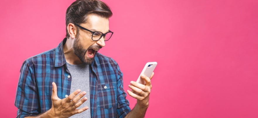 Man shouting at phone